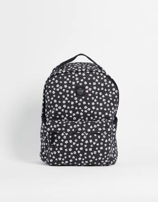 Typo backpack in black ditsy flower design