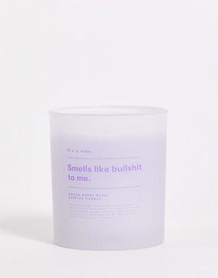 Typo candle with 'smells like' slogan in white