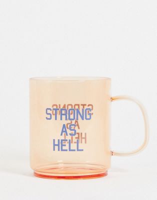 Typo glass mug with 'strong' slogan