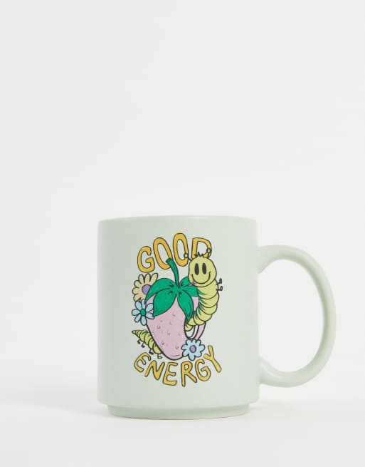 Typo - Mok met 'Good Energy'-slogan in groen
