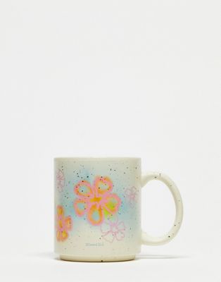 Typo mug with 'blissed out' slogan in hibiscus print