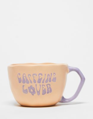 https://images.asos-media.com/products/typo-mug-with-caffeine-lover-slogan-in-peach-and-lilac/202498282-1-multi?$XXL$