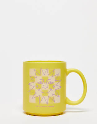 Typo mug with 'cup of sunshine' slogan in yellow