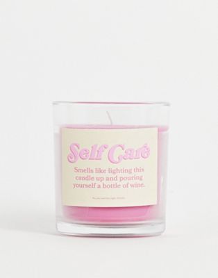 Typo self care candle in passionfruit mango scent