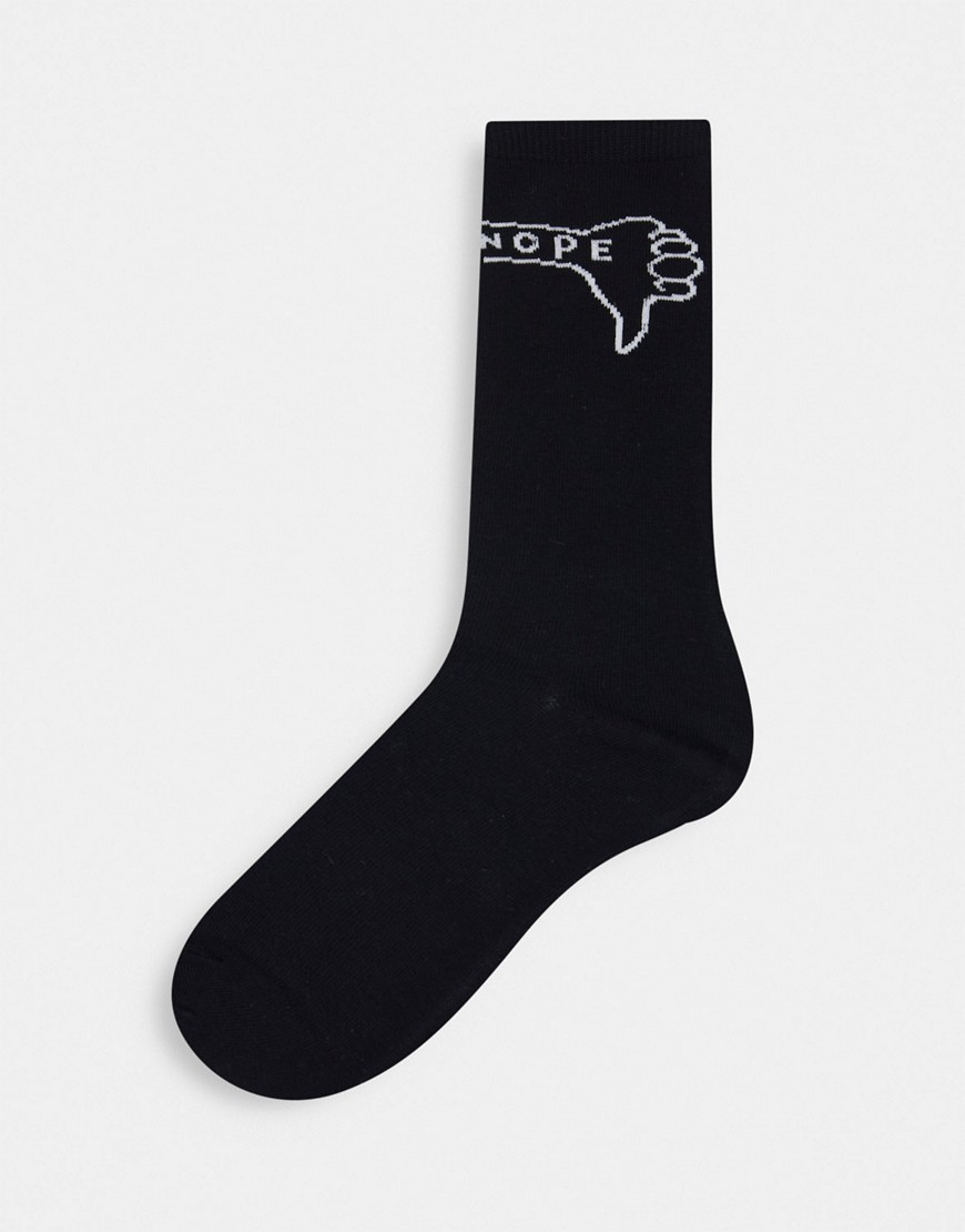 Typo socks in black with thumbs up and down motif