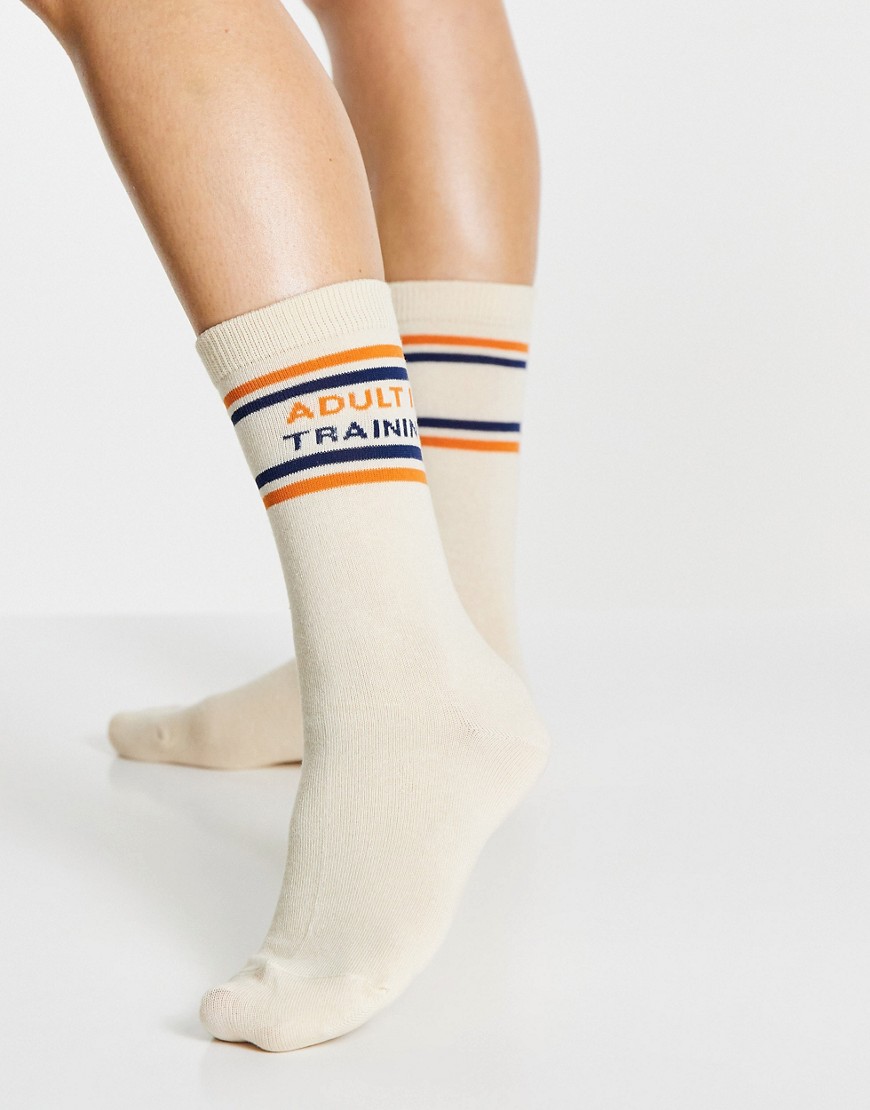 Typo socks with 'adult in training' slogan-White