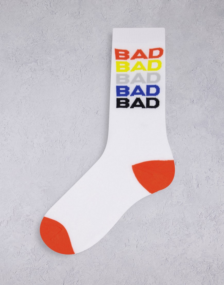 Typo socks with rainbow slogan 'bad ass' in white-Multi