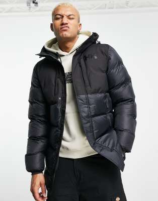 фото Удлиненный черный пуховик helly hansen active