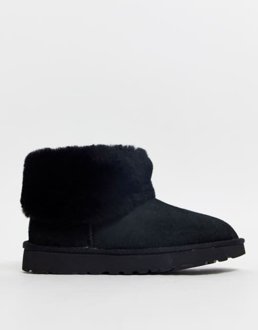 UGG Classic Mini Fluff ankle boots in black ASOS