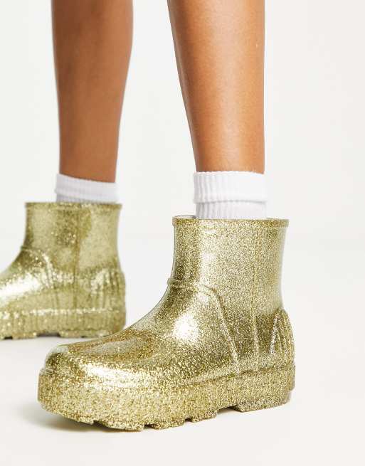 UGG Drizlita Bottes en caoutchouc scintillantes Dor ASOS