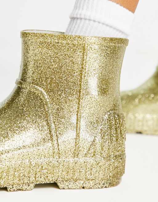 UGG – Drizlita – Guldfärgade glittriga gummistövlar, 3 av 4