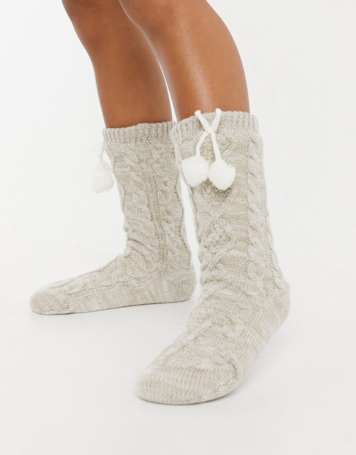 UGG fleece lined socks with pom pom in cream