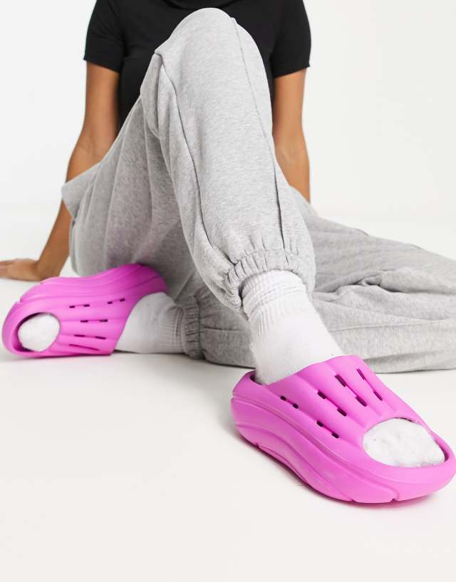 UGG foam slides in bright pink