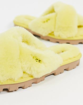 yellow fluffy ugg slippers