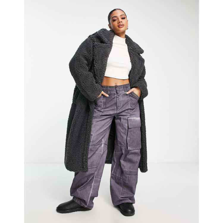 UGG Gertrude long teddy coat in black | ASOS