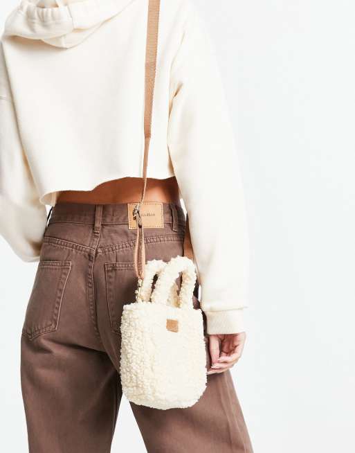 UGG Maribel mini sherpa cross body bag in cream | ASOS