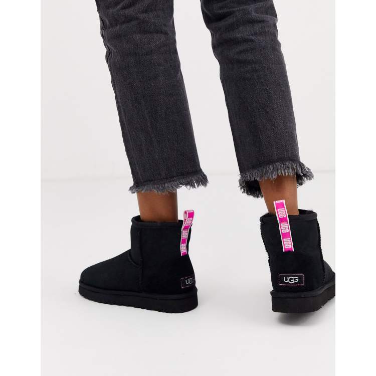 UGG Mini classic boot with neon logo taping in black and pink