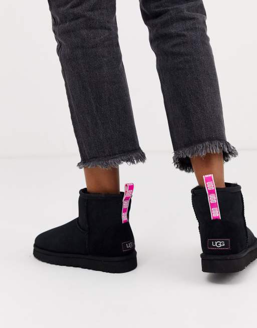 UGG Mini classic boot with neon logo taping in black and pink