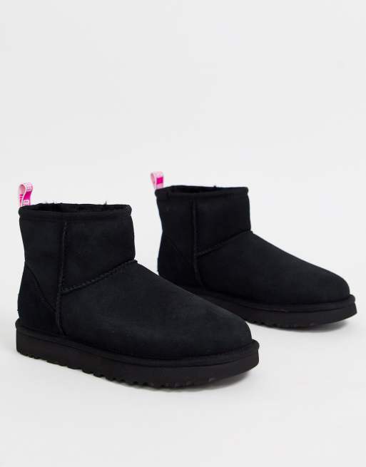 UGG Mini classic boot with neon logo taping in black and pink