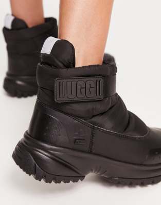 UGG Yose Puff boots in black | ASOS