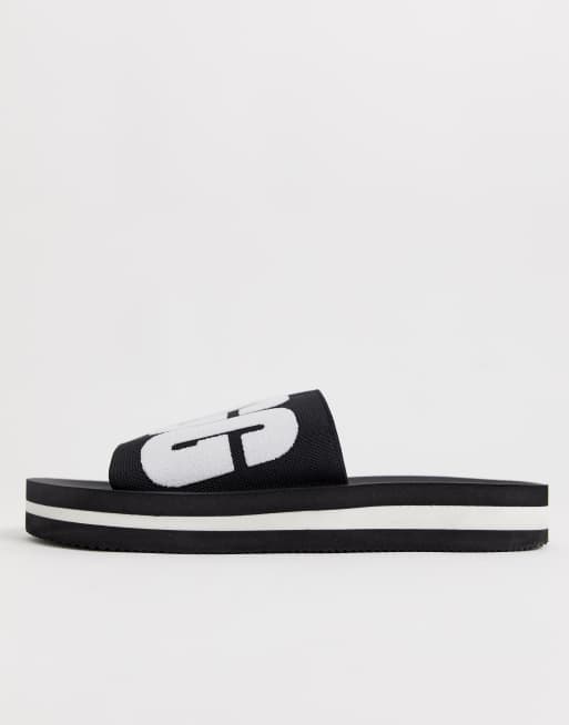 UGG Zuma logo slides in black