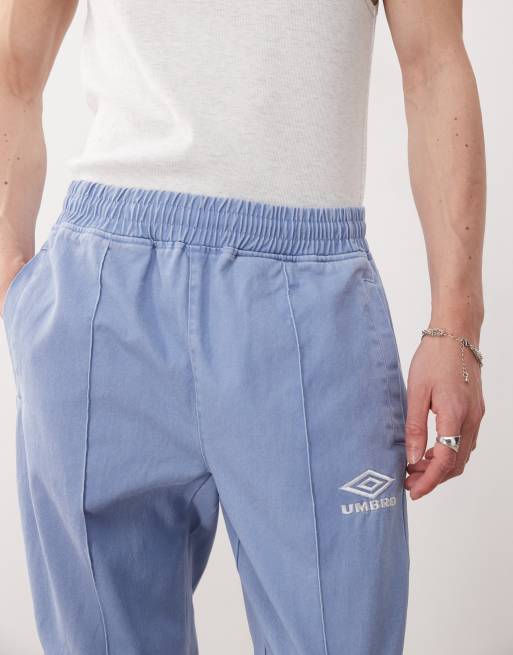XLARGE × UMBRO DRILL TOP & PANTS Shop Umbros Pretty Green x Umbro Black Drill Top Online