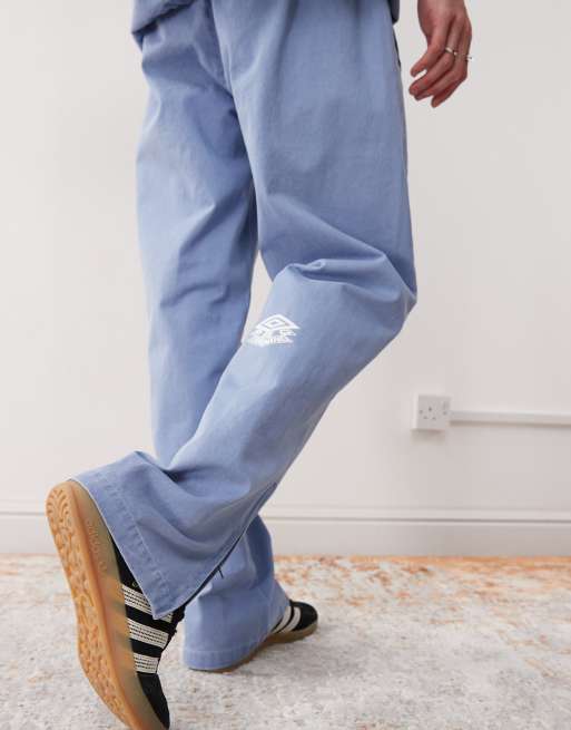 XLARGE × UMBRO DRILL TOP & PANTS Umbro Drill embroidered logo pants in blue | ASOS