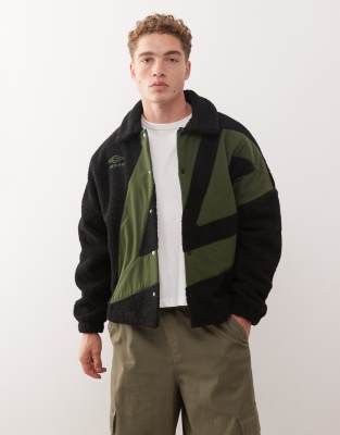 Umbro Umbro fleece coach jacket in black and green
