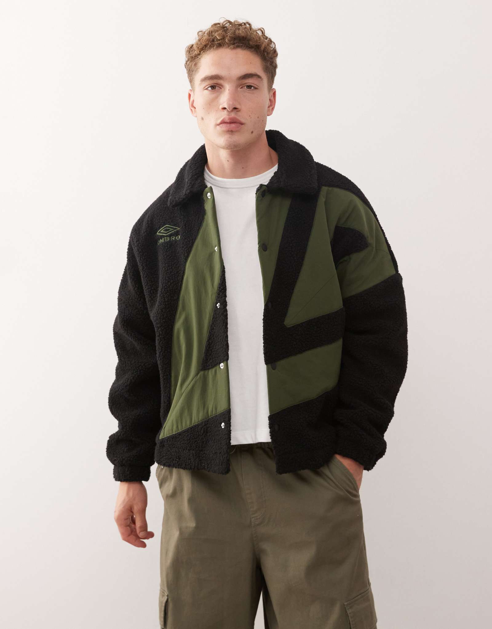 Черно-зеленая флисовая куртка coach от Umbro