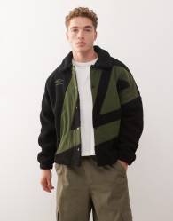 Umbro fleece coach jacket in black and green