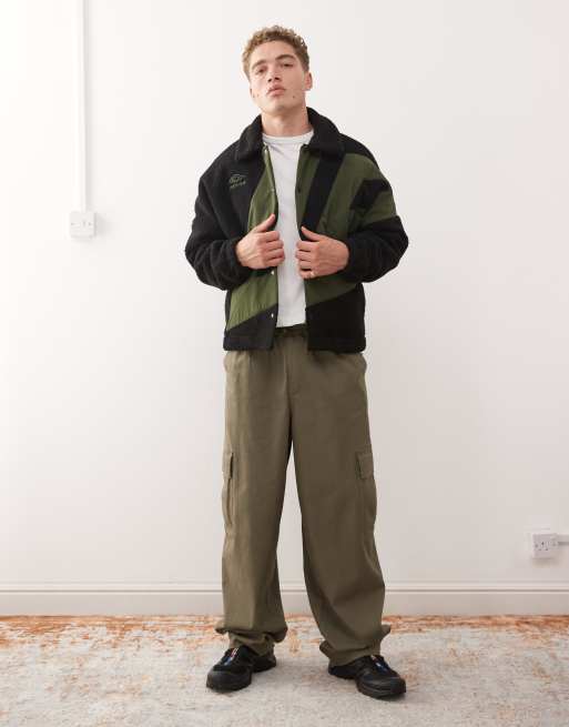 Umbro fleece coach jacket in black and green | ASOS