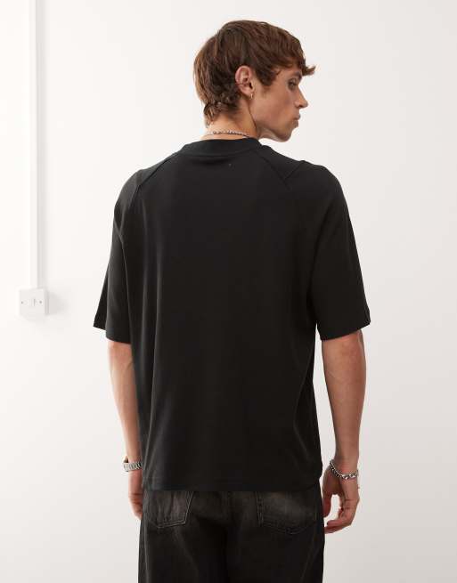 Umbro iconic boxy T-shirt in black | ASOS
