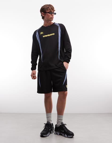 Umbro panelled jersey in black and yellow