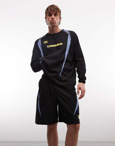 Umbro panelled oversized short in black and yellow - view 1