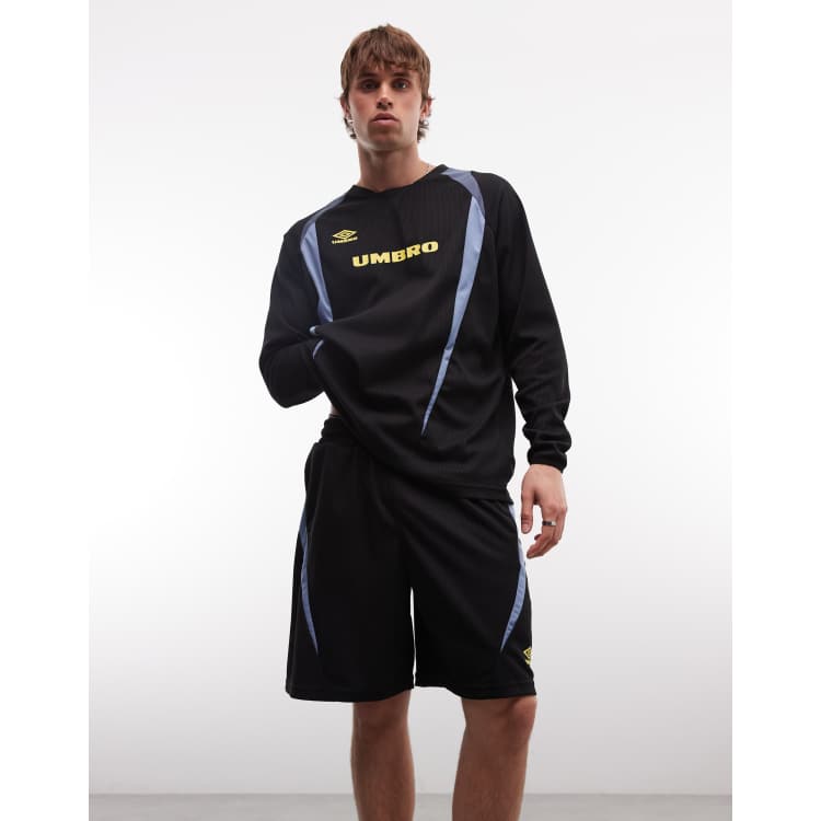 Umbro panelled oversized short in black and yellow | ASOS