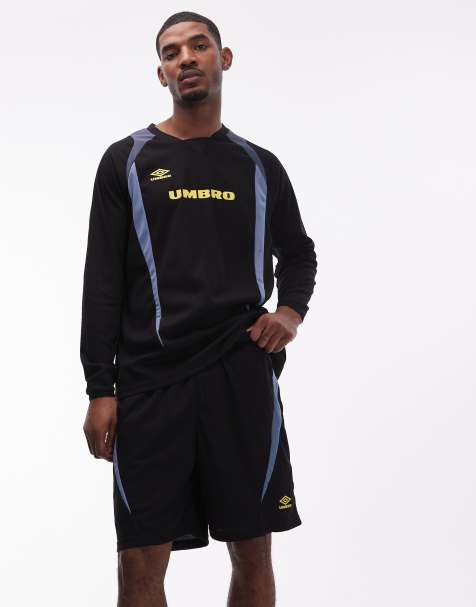 Umbro panelled oversized shorts in black and yellow - view 1
