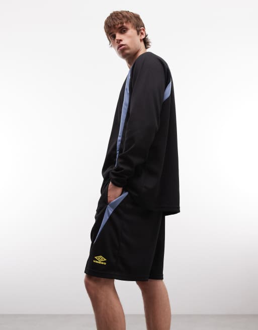 Umbro panelled oversized shorts in black and yellow, 3 of 5