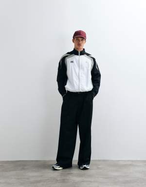 Umbro Relaxed Track Jacket in white and black
