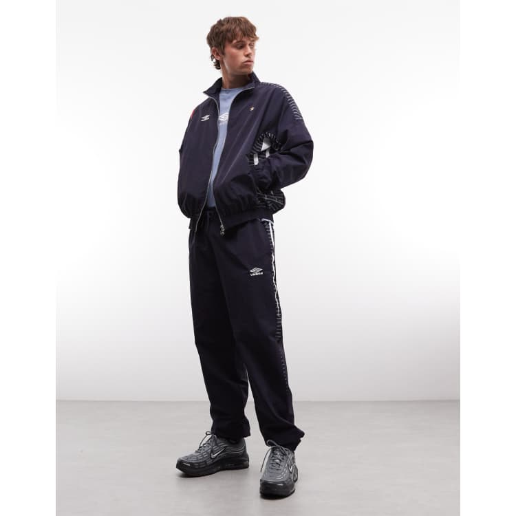 Umbro relaxed track pants in dark blue and white | ASOS