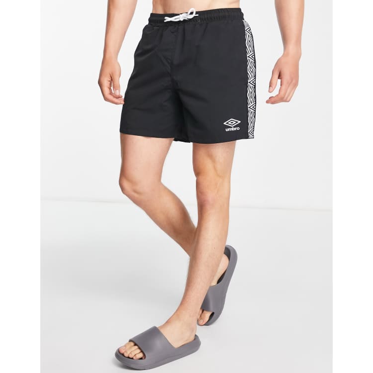 Umbro side taped logo swim shorts in black ASOS