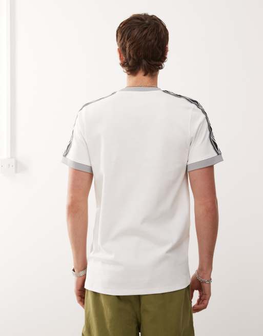 Umbro taped T-shirt in white | ASOS