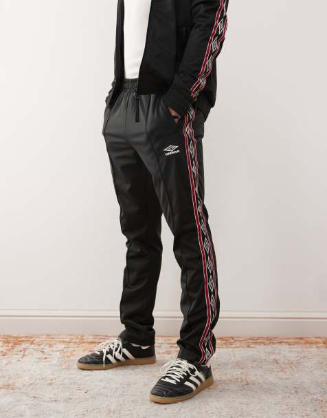 Umbro taped track pant in black