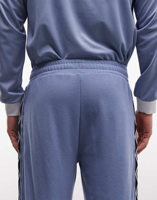 Umbro taped track pant in blue, 5 of 5