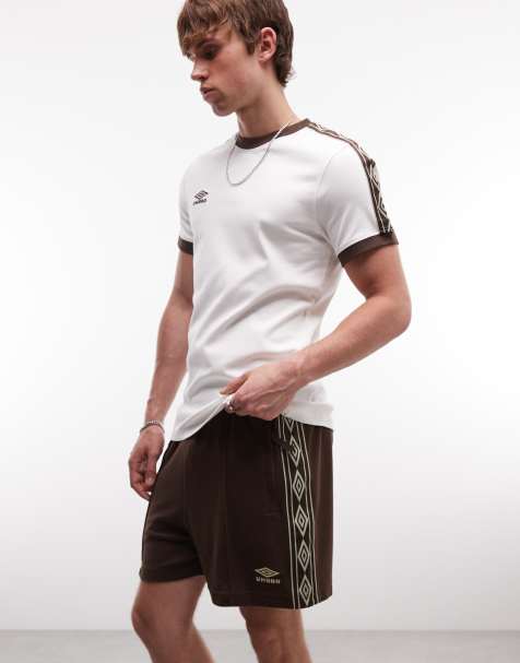 Umbro taped track shorts in brown - view 1