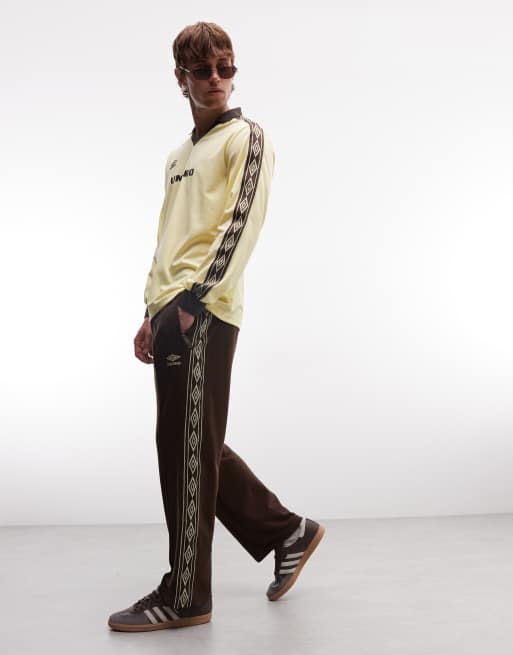Umbro – Trainingshose in Braun mit Zierband, 5 von 5