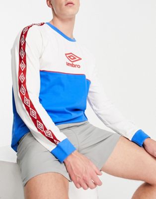 Umbro Home Turf taped long sleeved t-shirt in white and blue