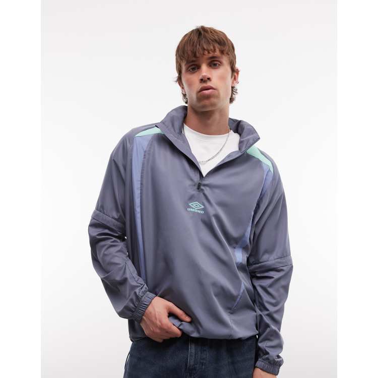 Umbro zip off sleeve wind jacket in grey and blue | ASOS