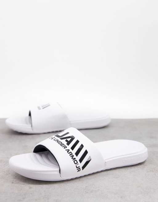 Under Armour - Ansa - Claquettes de football à imprimé graphique - Blanc