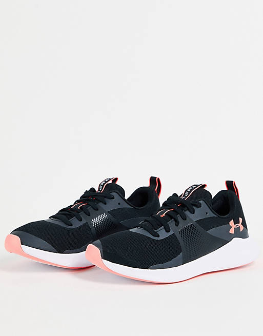 Under Armour Charged Aurora trainers in black with pink logo