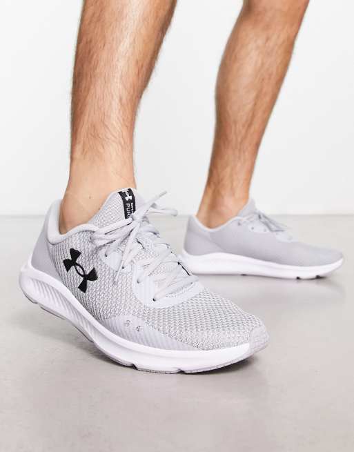 White and grey under store armour shoes